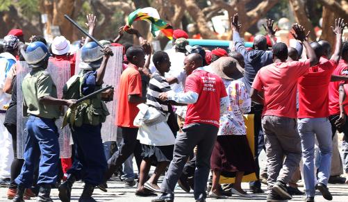 Zimbabwe police use teargas, water cannon to disperse opposition march