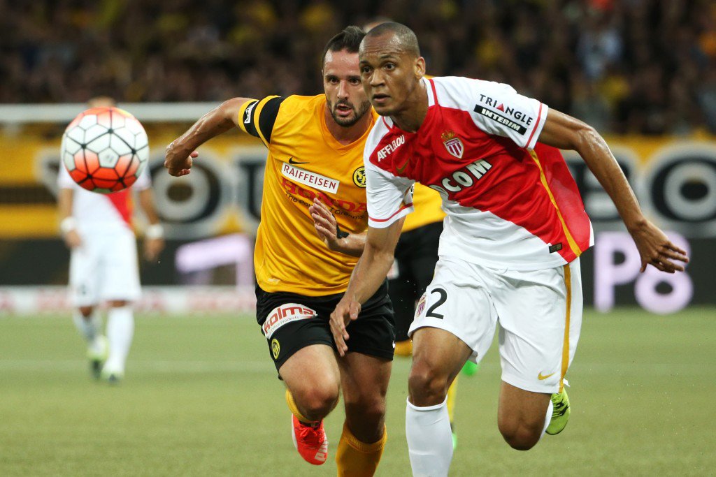 BERN SWITZERLAND- JULY 28 Raphael Nuzzolo of BSC Young Boys fights for the ball with Fabinho of AS Monaco during the UEFA Champions League third qualifying round 1st leg match between BSC Young Boys and AS Monaco at Stade de Suisse