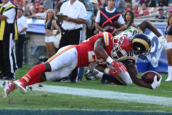 LOS ANGELES CA- AUGUST 20 Pharoh Cooper #10 of the Los Angeles Rams scores a touchdown in the second quarter against Steven Nelson #20 of the Kansas City Chiefs at Los Angeles Memorial Coliseum