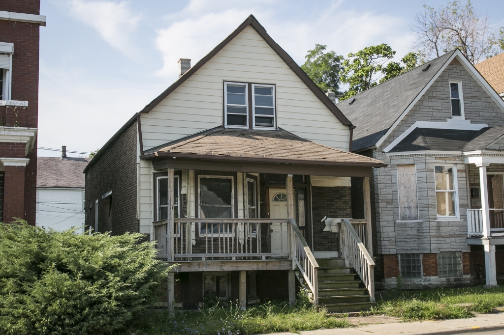 The body of a 4-year-old boy was found after a fire was extinguished in a vacant house in the 1400 block of West Marquette Road in the Englewood neighborhood Tuesday night. | Ashlee Rezin  Sun-Times