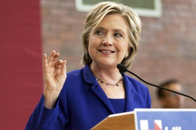 Clinton was welcomed with loud cheers as she entered the arena and embraced her daughter Chelsea who introduced her as the next President of the United States