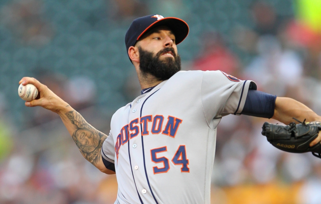 Houston Astros starting pitcher Mike Fiers throws to the Minnesota Twins during the first inning of a baseball game Tuesday Aug. 9 2016 in Minneapolis