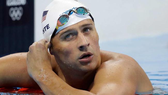 Olympic swimmers 'removed from flight' by Brazilian police over robbery allegation