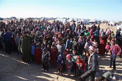 Syrian refugees inside the border wait to be approved to get into Jordan in the Hadalat reception area near the northeastern Jordanian border with Syria and Iraq near the town of Ruwaished Jordan. The Senate