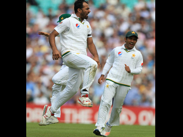 Pakistan's Wahab Riaz left celebrates taking the wicket of England's James Vince for 1 during day one of the Fourth Test match between England and Pakistan at The Oval in London