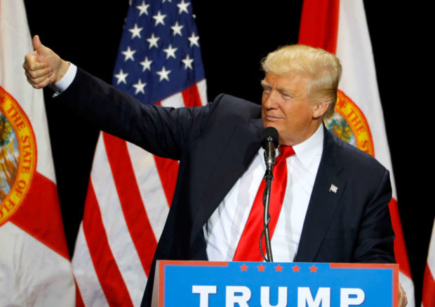 Republican U.S. presidential candidate Donald Trump gestures during a campaign rally in Tampa Florida