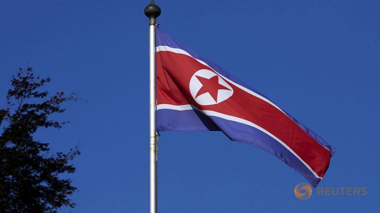 A North Korean flag flies on a mast at the Permanent Mission of North Korea in Geneva