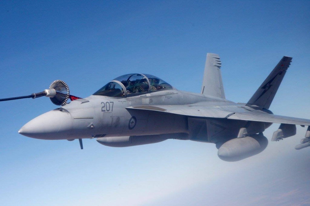 A RAAF F  A-18F Super Hornet conducts an air-to-air refuelling