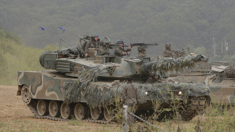 A South Korean Army's K1 tank moves during an annual exercise in Paju South Korea near the border with North Korea