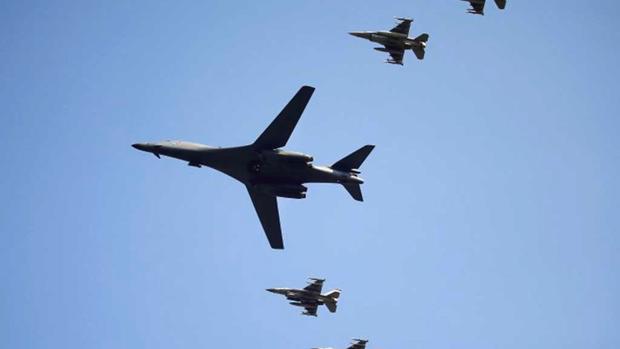 A U.S. Air Force B-1B bomber flies over Osan Air Base in Pyeongtaek South Korea