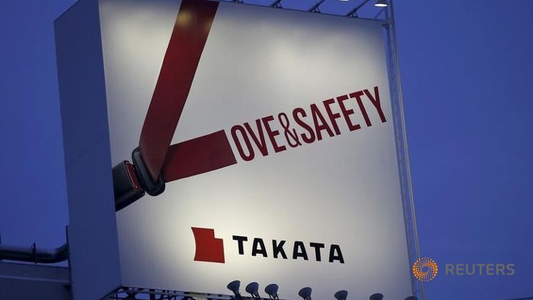 A billboard advertisement of Takata Corp