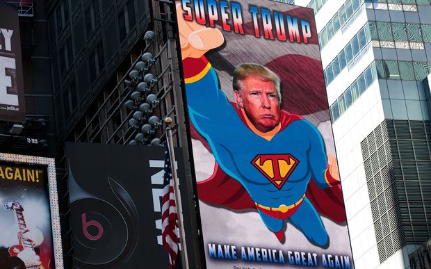 A digital billboard supporting Donald Trump depicts him as 'Super Trump&#39 in Times Square