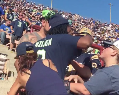 A fight between a Seattle Seahawks fan and several Los Angeles Rams broke out Sept. 18 2016 in the Los Angeles Memorial Coliseum