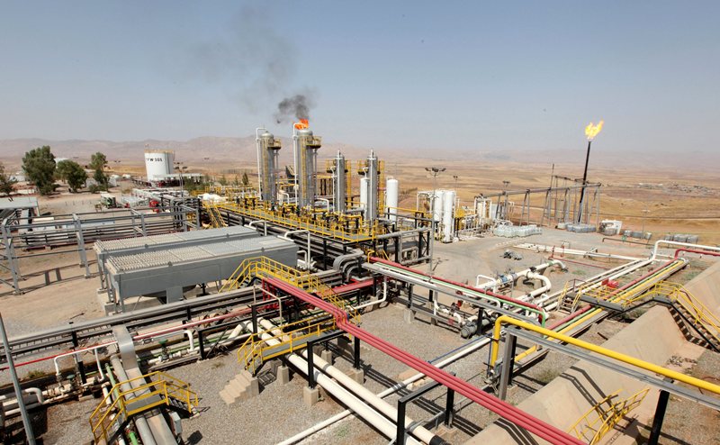 A flame rises from a chimney at Taq Taq oil field in Arbil in Iraq's Kurdistan region