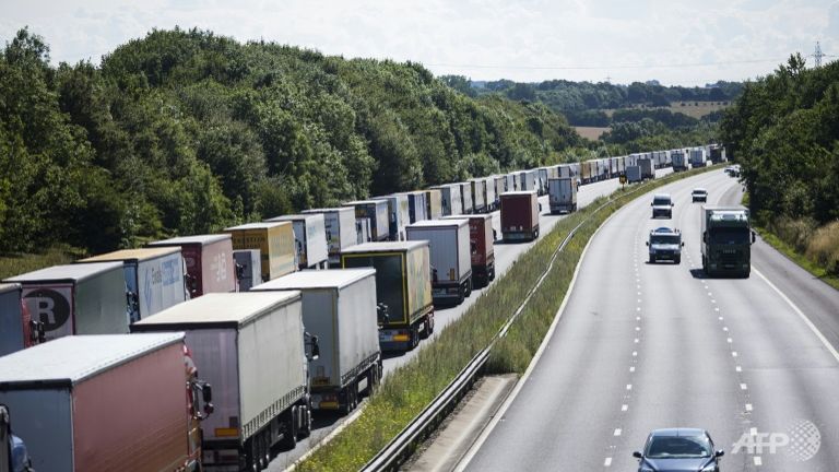 A footbridge over the M20 motorway in Kent southeast England came down after seemingly being hit by a truck police said