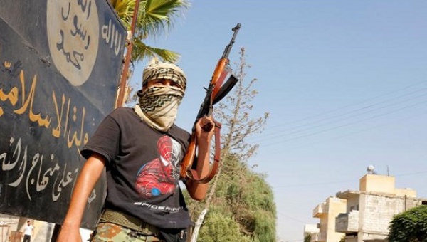 A member of the Turkish-backed Free Syrian Army patrols in the border town of Jarablus Syria