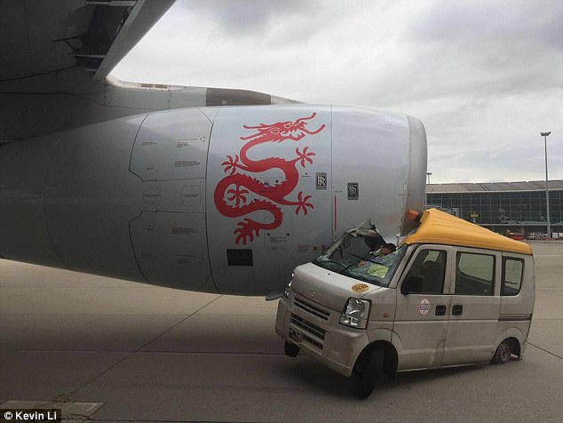 A passenger plane has collided with a service van at Hong Kong International Airport