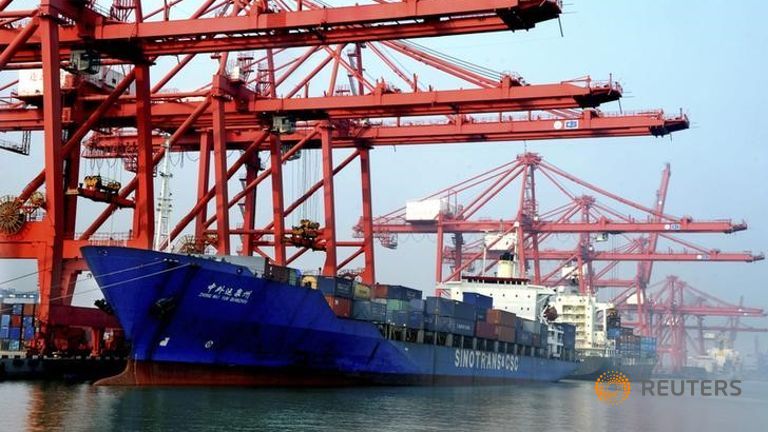 A ship loaded with containers is seen at a port in Lianyungang.
   
 

  Enlarge  Caption