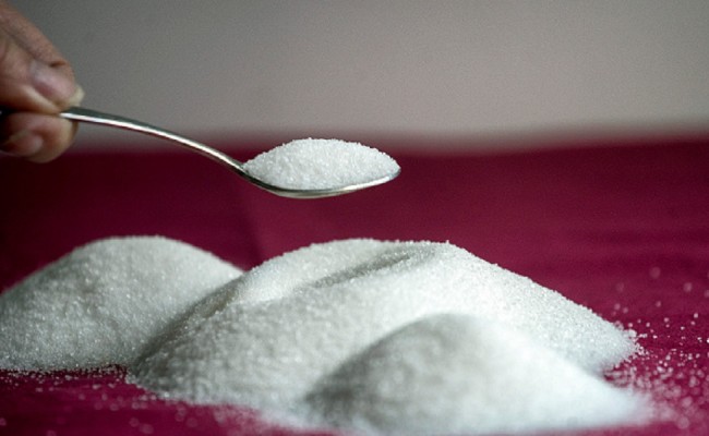 A teaspoon of sugar is seen