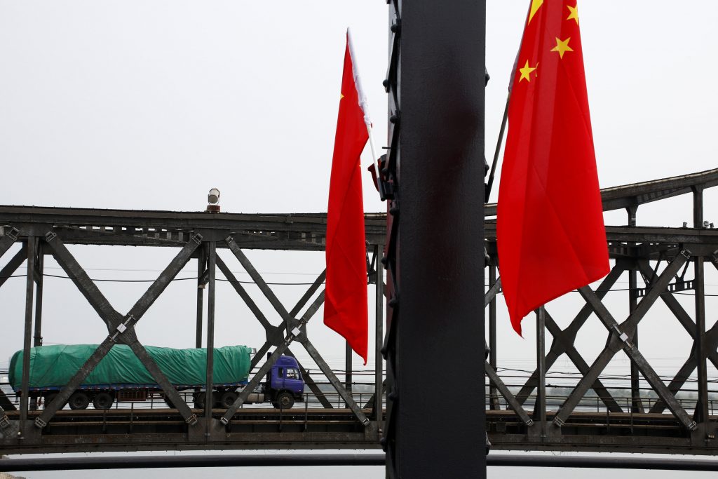 A truck crosses Friendship Bridge from China's Dandong Liaoning province to North Korea's Sinuiju