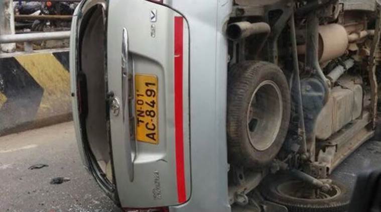 A vehicle bearing Tamil Nadu registration number overturned by pro Kannada protesters in Bengaluru