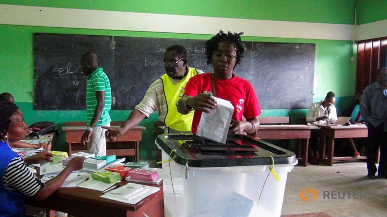 A woman votes during the presidential election in Libreville Gabon