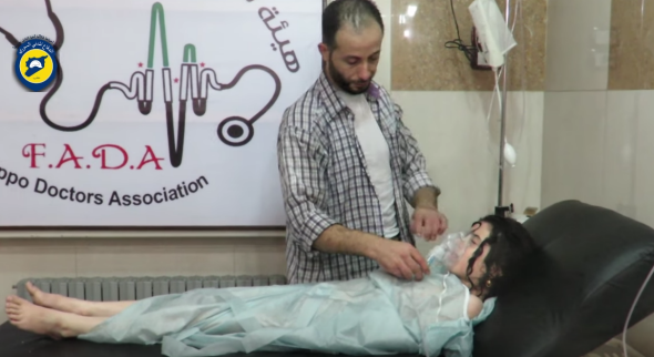 A young child being treated following apparent chlorine attack in Aleppo. Screenshot White Helmets Youtube video