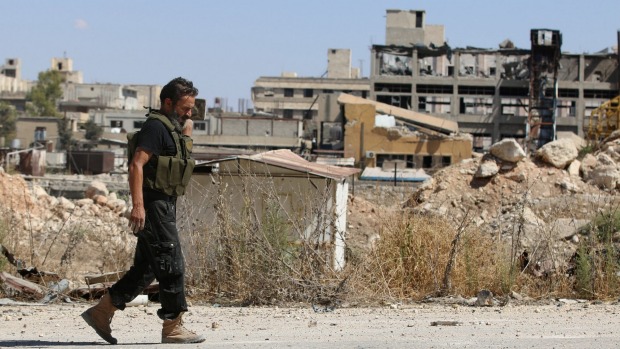 A rebel fighter in Syria where a resolution to the conflict remains elusive