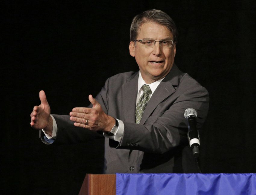 North Carolina Gov. Pat Mc Crory speaks during a candidate forum in Charlotte N.C. in June. A law signed by Mc Crory requires transgender people to use restrooms at schools and government buildings corresponding to the sex on their birth certificates