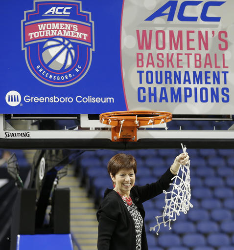 Notre Dame head coach Muffet Mc Graw celebrates after an NCAA college basketball game against Florida State in the championship of the Atlantic Coast Conference tournament in Greensboro N.C. NCAA President Mark Em