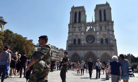 Police patrol near Notre Dame