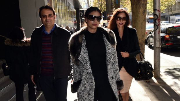 Pankaj Oswal and his wife Radhika and daughter Vasundhara leave court in Melbourne There is little doubt