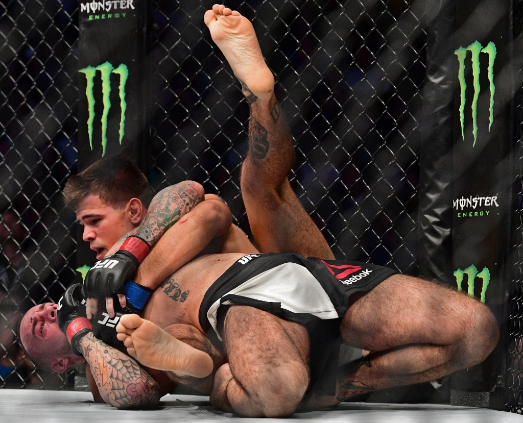 Mickey Gall wrestles CM Punk during a welterweight bout at UFC 203 on Saturday Sept. 10 2016 in Cleveland. ORG XMIT OHDD118