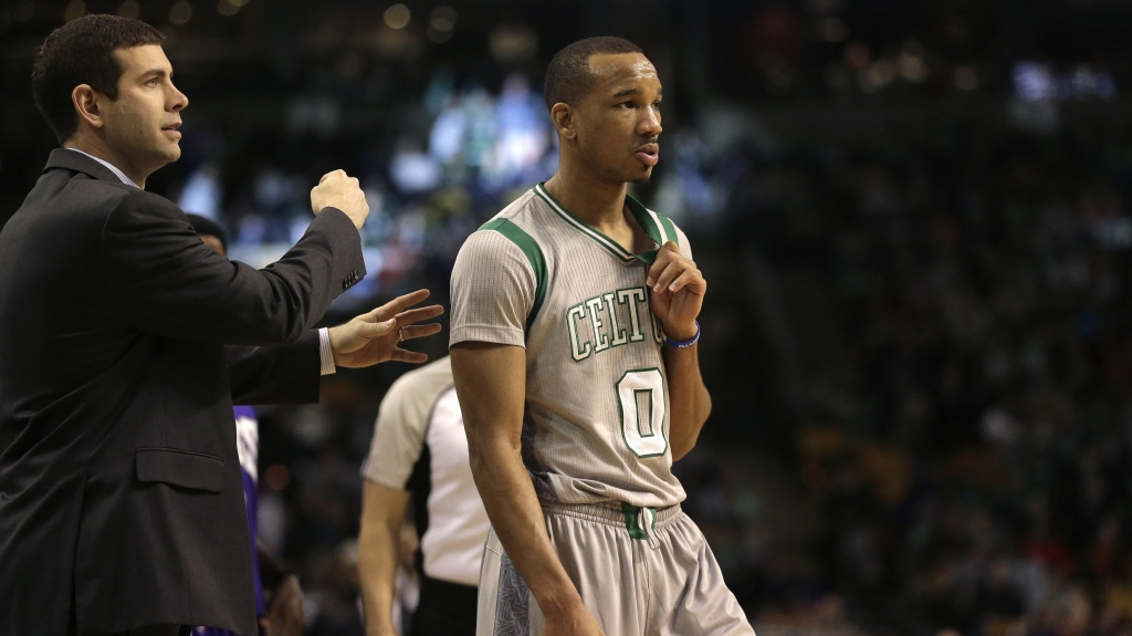 Boston Celtics head coach Brad Stevens left gestures as Celtics guard Avery Bradley steps on the court in the fourth quarter of an NBA basketball game against the Sacrament Kings Sunday Feb. 7 2016 in Boston. The Celtics won 128-119. (AP