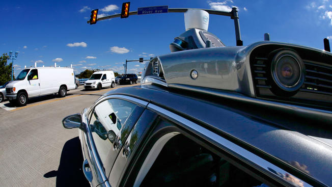 APA self driving Uber turns onto the 31st street bridge on Pittsburgh's Northside during a media preview Monday Sept. 12 2016