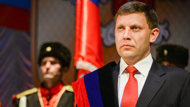 APFile- Rebel leader Alexander Zakharchenko stands during a swearing in ceremony in Donetsk on Tuesday Nov. 4 2014