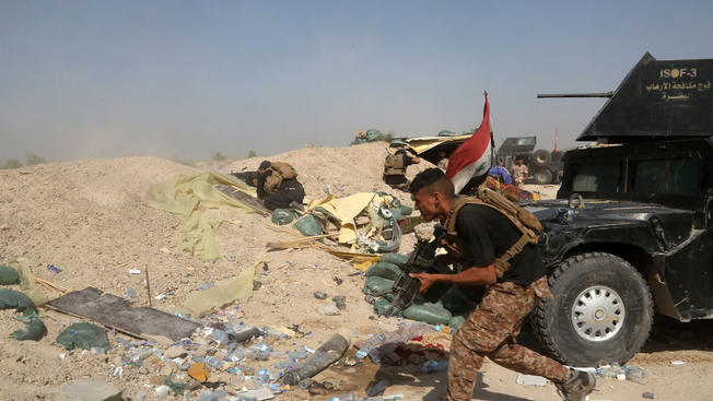 APIraqi counterterrorism forces face off with Islamic State militants in the Nuaimiya neighborhood of Fallujah Iraq Wednesday