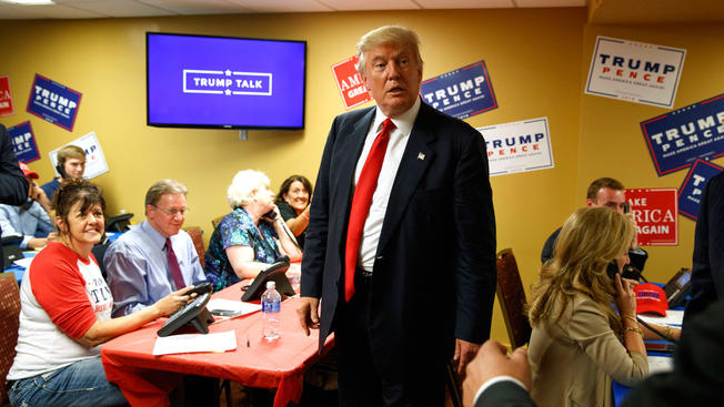 APRepublican presidential candidate Donald Trump visits a call center before the start of a rally Sept. 12 2016 in Asheville North Carolina