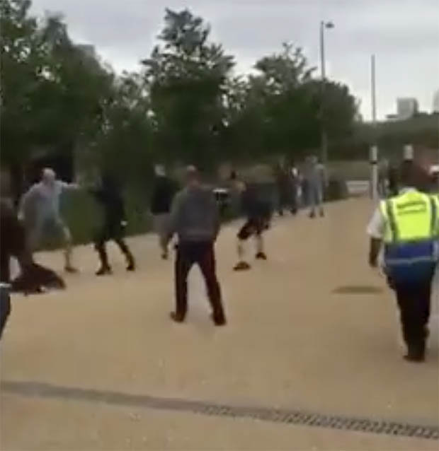 AWAYDAYS    
     SCRAP A passer-by captured violent scenes following West Ham's win over Bournemouth yesterday