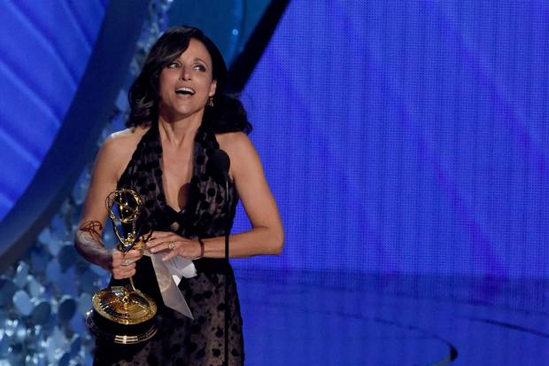 Actress Julia Louis Dreyfus accepts Outstanding Lead Actress in a Comedy Series for'Veep.  AFP  Valerie MACON