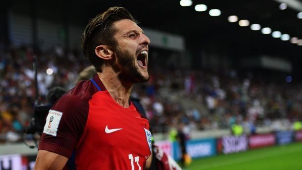 Adam Lallana celebrates his match-winner