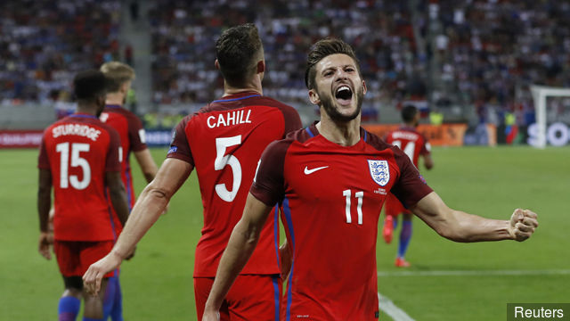 England's Adam Lallana celebrates scoring their first goal with team mates