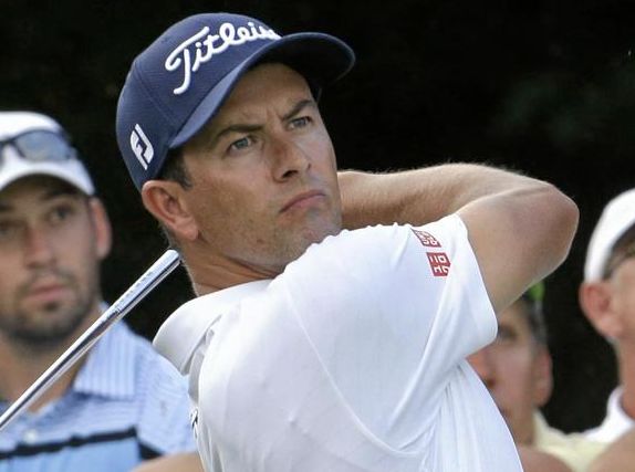 Adam Scott of Australia watches his shot from the sixth tee during the first round of the BMW Championship