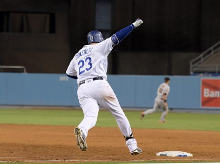 Sep 19 2016 Los Angeles CA USA Los Angeles Dodgers first baseman Adrian Gonzalez celebrates after hitting a walk-off double in the ninth inning in a 2-1 victory over the San Francisco Giants during a MLB game at Dodger Stadium. Mandatory Credit