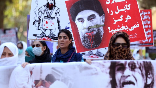 Afghan demonstrators shout slogans against Gulbuddin Hekmatya the leader of Hizb-i Islami Gulbuddin party during a demonstration in a public park in Kabul Afghanistan. | AP