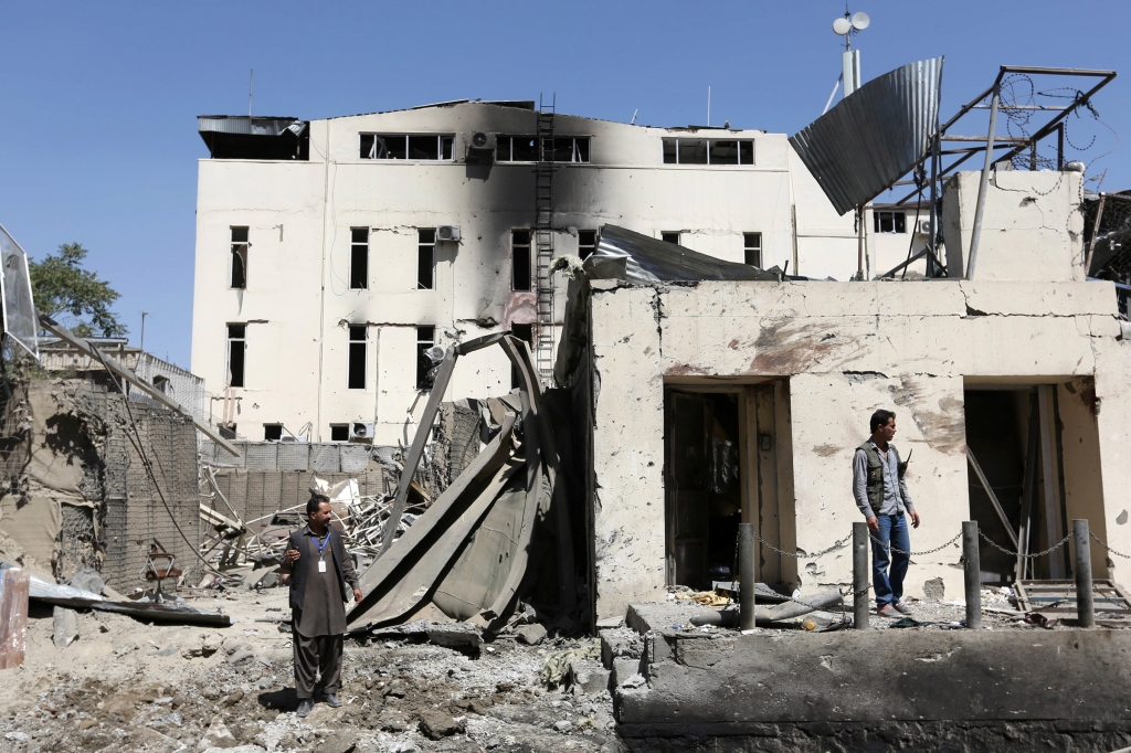 Afghan security members inspect at the site of suicide attack in Kabul Afghanistan Tuesday Sept. 6 2016