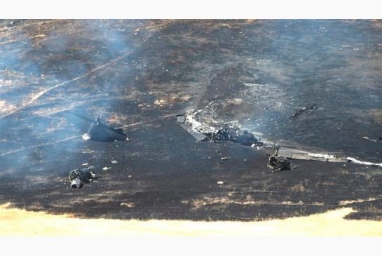 Smoke rises from the wreckage of a U.S. Air Force U-2 spy plane that crashed in the Sutter Butte mountains Tuesday Sept. 20 2016 near Yuba City Calif. The plane had just taken off on a training mission from nearby Beale Air Force Base. The two pilots