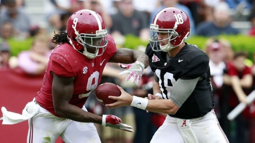 Apr 16 2016 Tuscaloosa AL USA Alabama Crimson Tide quarterback Cooper Bateman hands the ball off too Alabama Crimson Tide running back Bo Scarbrough at Bryant Denny Stadium. Mandatory Credit Marvin Gentry-USA TODAY Sports