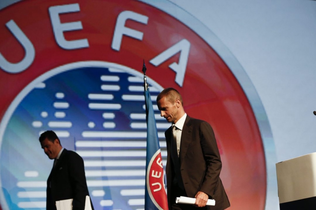 Aleksander Ceferin leaves after a press conference at extraordinary UEFA congress in Athens