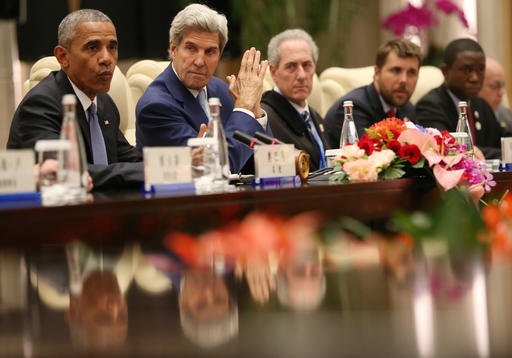 U.S. President Barack Obama left and Secretary of State John Kerry second left meet with the delegation of Chinese President Xi Jinping on the sidelines of the G-20 summit at the West Lake State Guest House in Ha